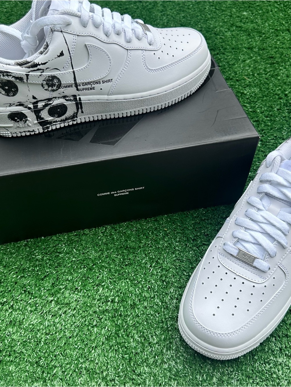 Nike White Low-Top Sneakers with Black Graphic Accents